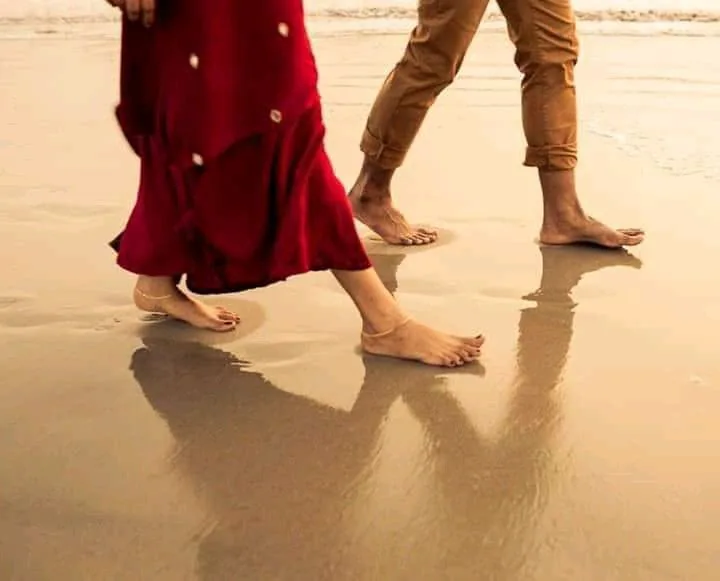 Couple walking on beach